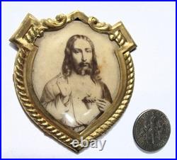 1890s antique catholic gold tone metal Jesus large shield pocket icon 54386