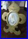 Antique-French-Brass-Standing-religious-frame-Saint-Germanine-medaillon-paint-01-qdxj