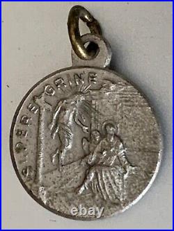 Antique Religious Fabric Relic in a silver medal container Ex Indumentis 1.5cm