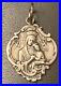 Antique-Sterling-Silver-Detailed-Virgin-Mother-Mary-Baby-Jesus-Religious-Pendant-01-ear