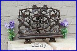 Antique black forest wood carved German religious bible stand