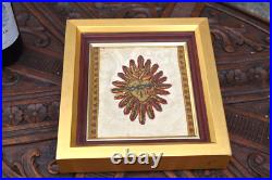 Antique religious plaque with lithurgical brocade bleeding hearth inside