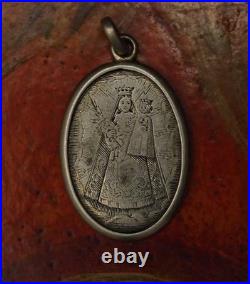 Antique religious silver engraved medal pendant of The Holy Lady of Einsiedeln