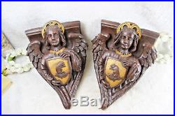 PAIR antique wood carved religious church wall console angels putti escutcheon