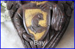 PAIR antique wood carved religious church wall console angels putti escutcheon