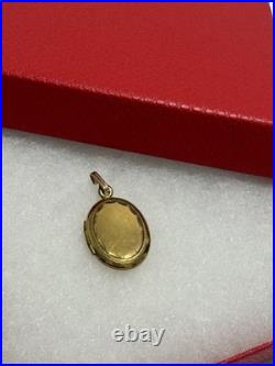 This vintage gold reliquary is a classic piece of jewelry designed to store 14k