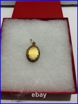 This vintage gold reliquary is a classic piece of jewelry designed to store 14k